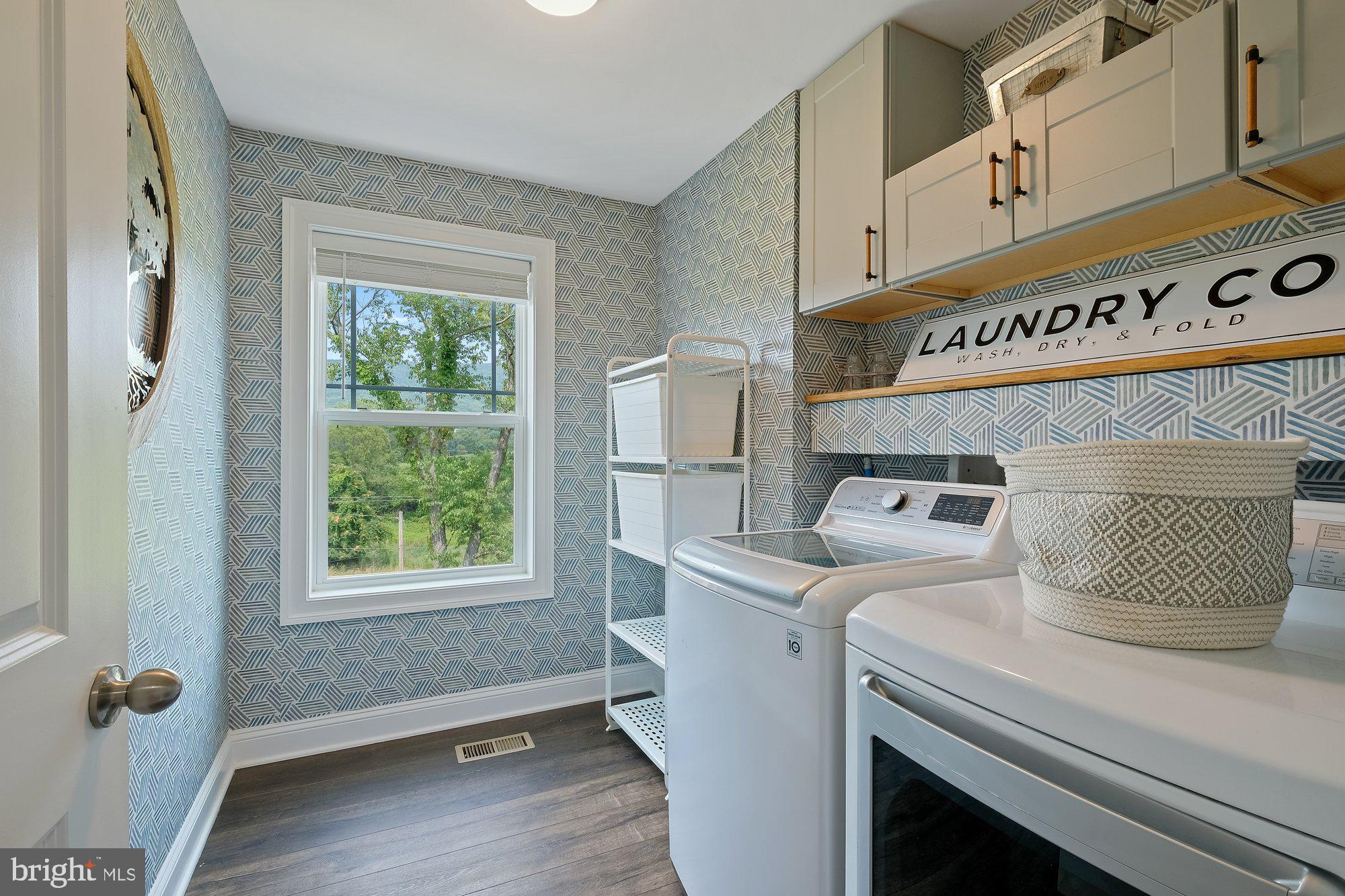 8712 Hollow Road Middletown, MD 21769 - Photo 18 of 37 Separate Upstairs laundry room w/ custom cabinets