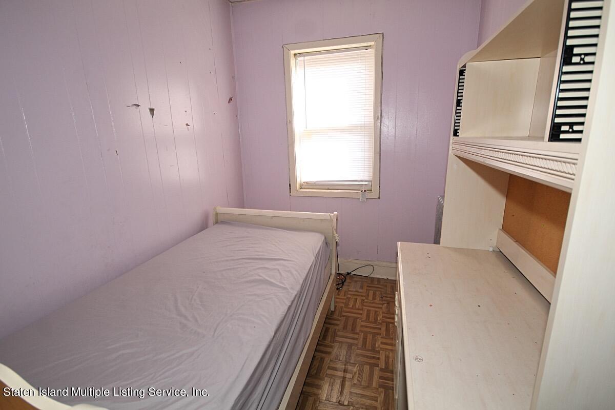 985 Lorimer Street Brooklyn, NY 11222 - Photo 19 of 23 a bed room with a bed and a window