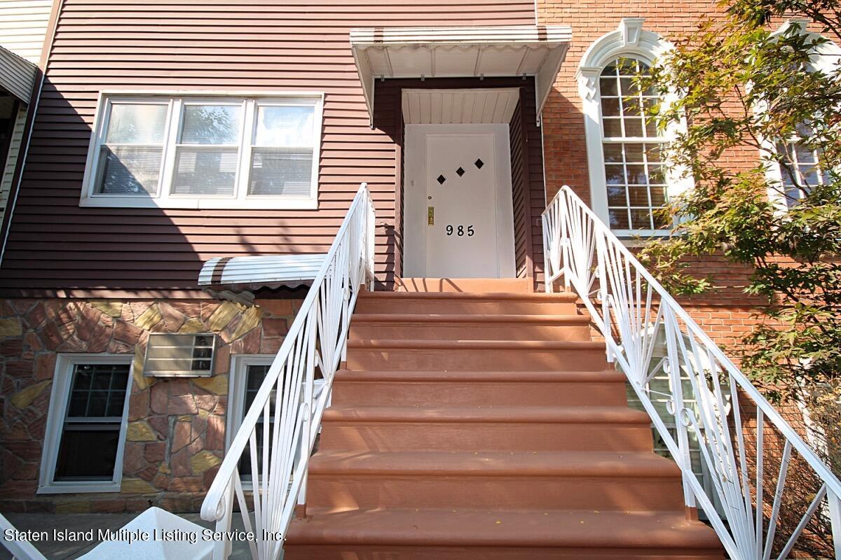 985 Lorimer Street Brooklyn, NY 11222 - Photo 2 of 23 a view of entryway with wooden floor and a front door