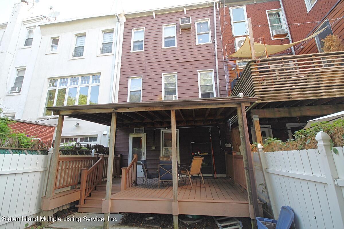 985 Lorimer Street Brooklyn, NY 11222 - Photo 21 of 23 a view of a brick building with a porch