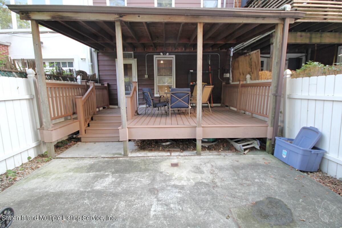 985 Lorimer Street Brooklyn, NY 11222 - Photo 22 of 23 a view of a chair and tables in patio of the house