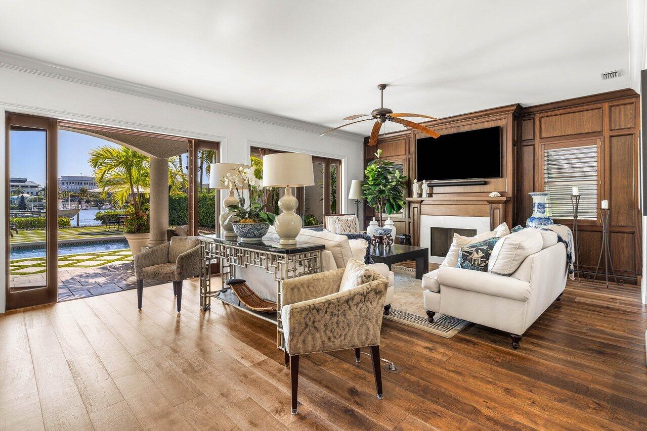 281 Fishermans Way Jupiter, FL 33477 - Photo 19 of 45 a living room with fireplace furniture and a flat screen tv