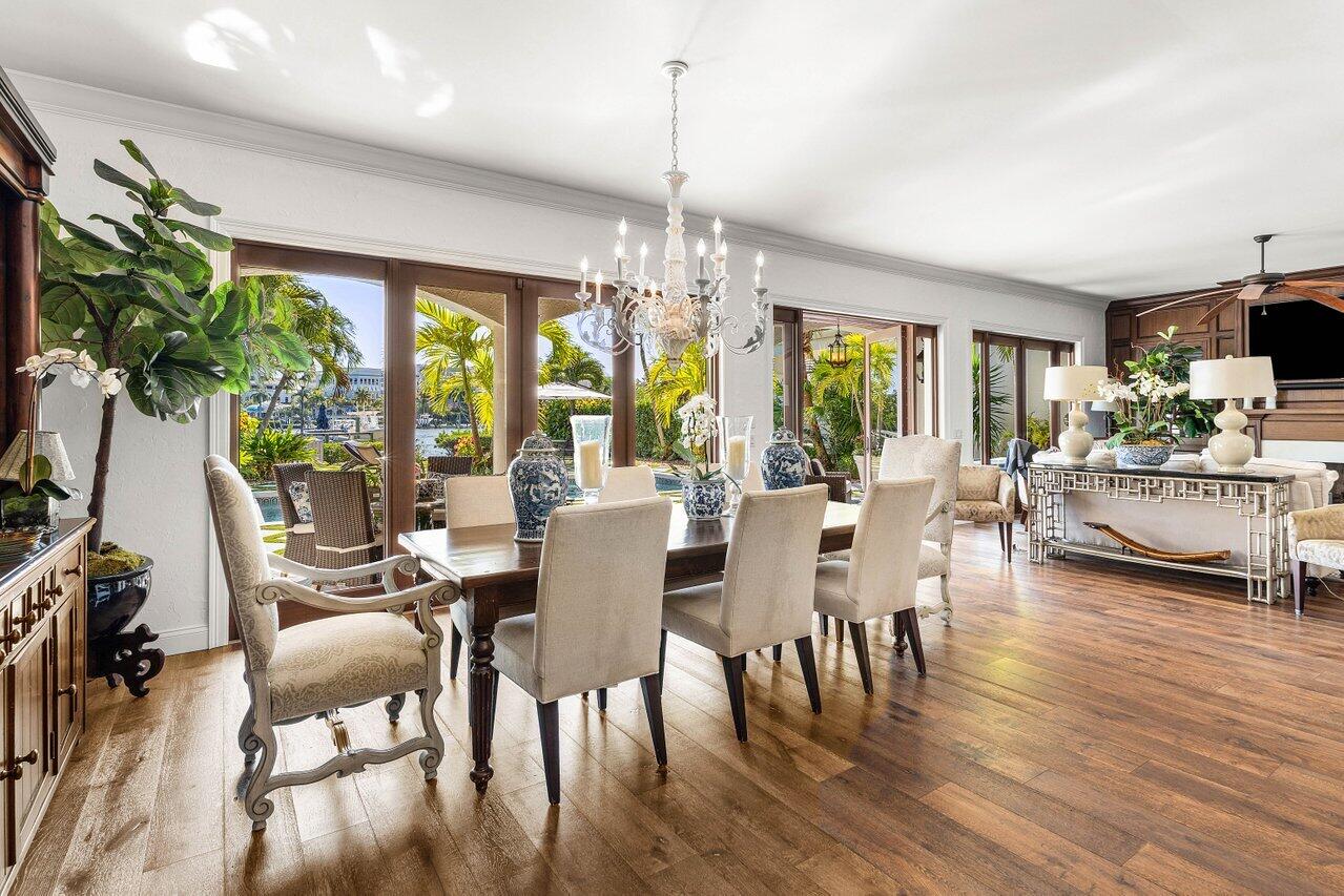 281 Fishermans Way Jupiter, FL 33477 - Photo 20 of 45 a view of a dining room with furniture window and wooden floor