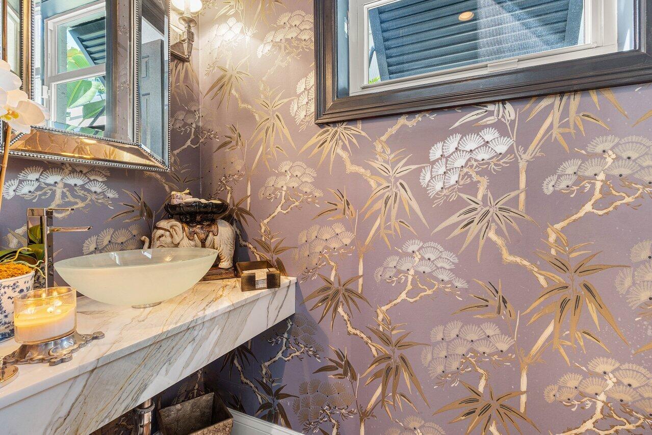 281 Fishermans Way Jupiter, FL 33477 - Photo 22 of 45 a bathroom with a granite countertop sink and a mirror