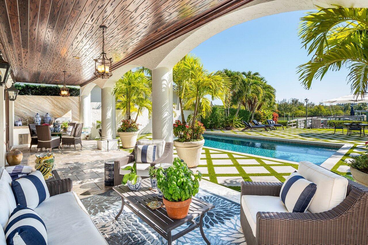 281 Fishermans Way Jupiter, FL 33477 - Photo 27 of 45 a view of swimming pool with outdoor seating