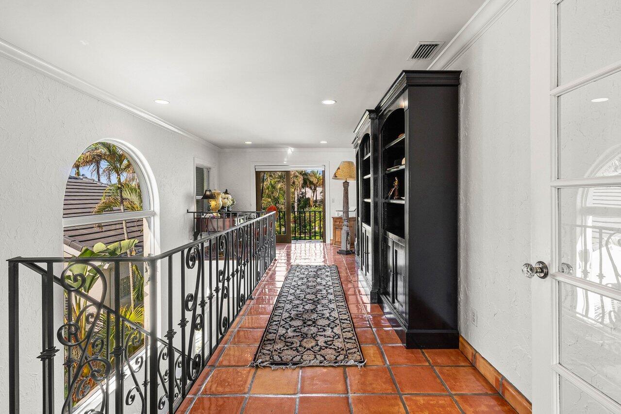281 Fishermans Way Jupiter, FL 33477 - Photo 33 of 45 a view of hallway with wooden floor and stairs