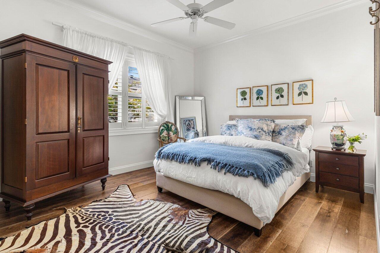 281 Fishermans Way Jupiter, FL 33477 - Photo 38 of 45 a spacious bedroom with a bed and a window