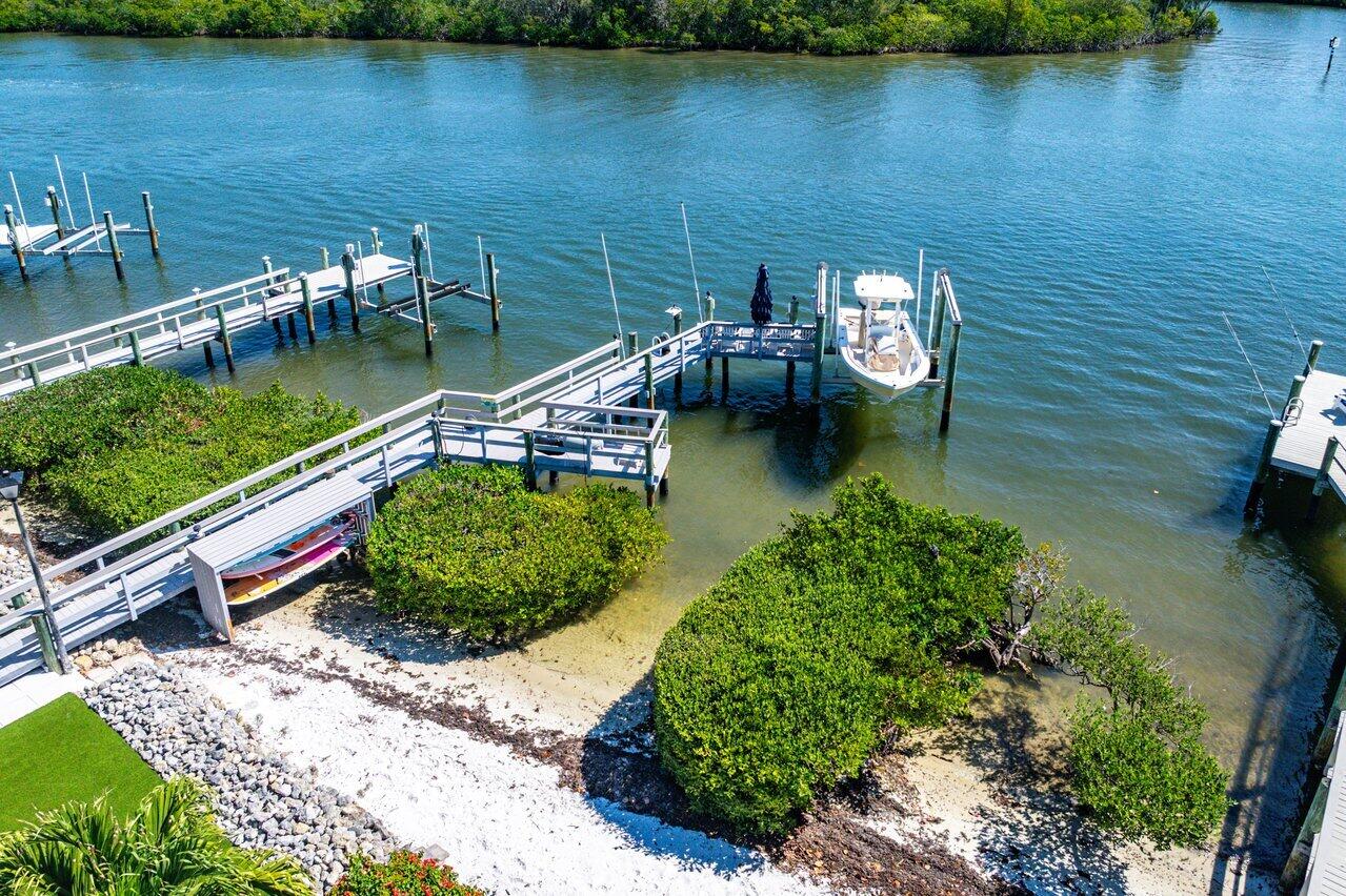 281 Fishermans Way Jupiter, FL 33477 - Photo 5 of 45 an aerial view of a house with a lake view