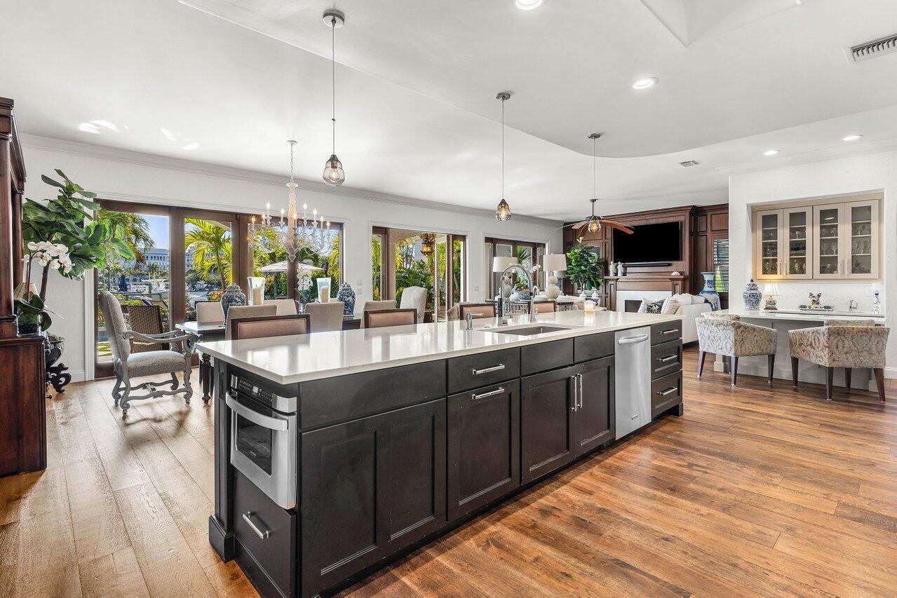 281 Fishermans Way Jupiter, FL 33477 - Photo 10 of 45 a kitchen with stainless steel appliances granite countertop a stove and a sink