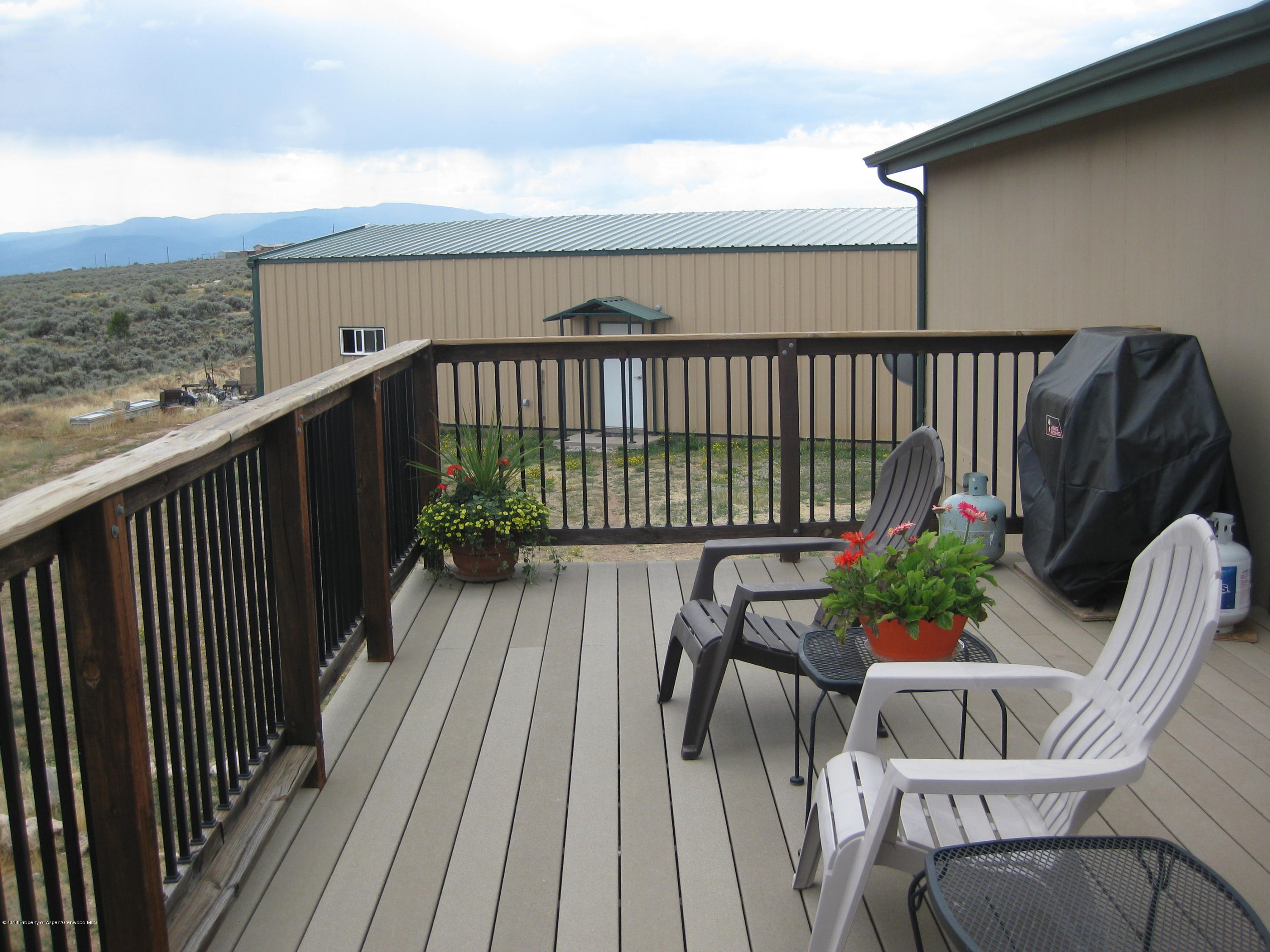 3251 Grass Mesa Road Rifle, CO 81650 - Photo 17 of 29 Deck looking east