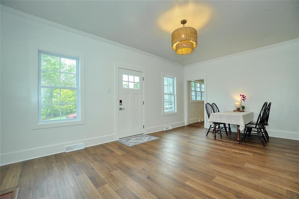 113 3rd Street Houston, PA 15342 - Photo 11 of 27 a view of a dining room with furniture and a window