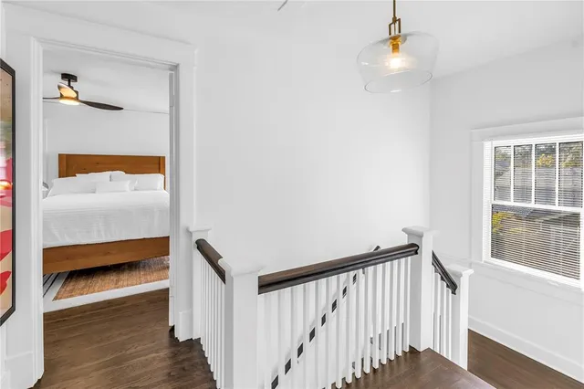 a view of a hallway with a bedroom