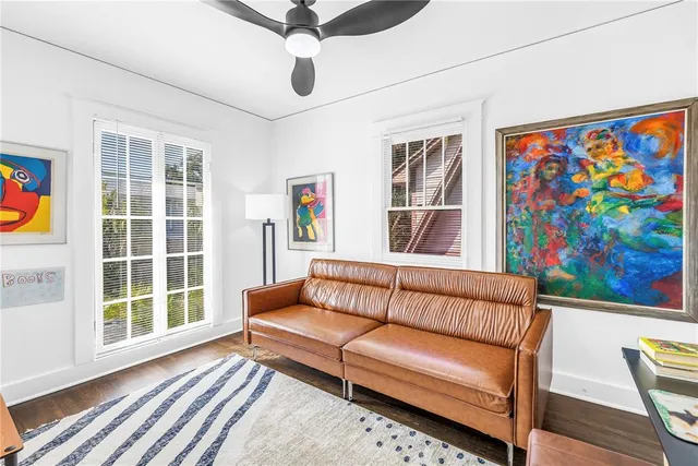 a living room with furniture and a window