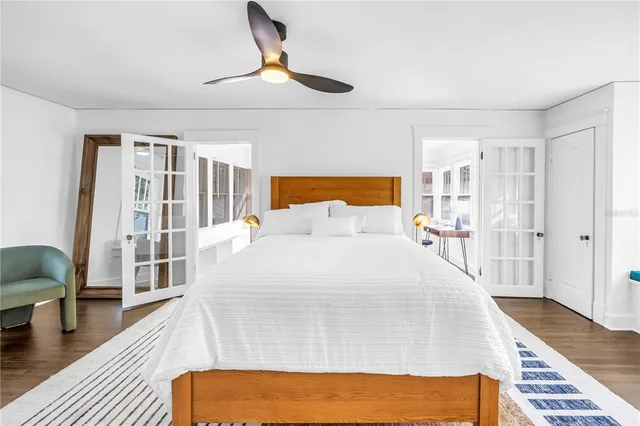 a large white bed in a white room