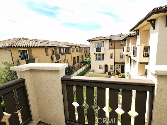 a terrace of a house with outdoor seating