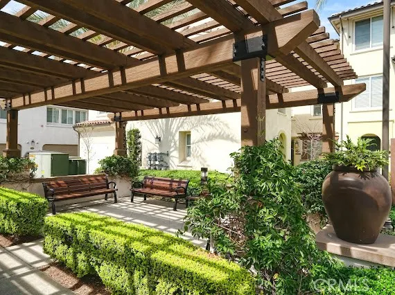 a view of a chairs and table in a patio