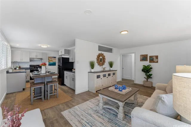 a living room with furniture and a table