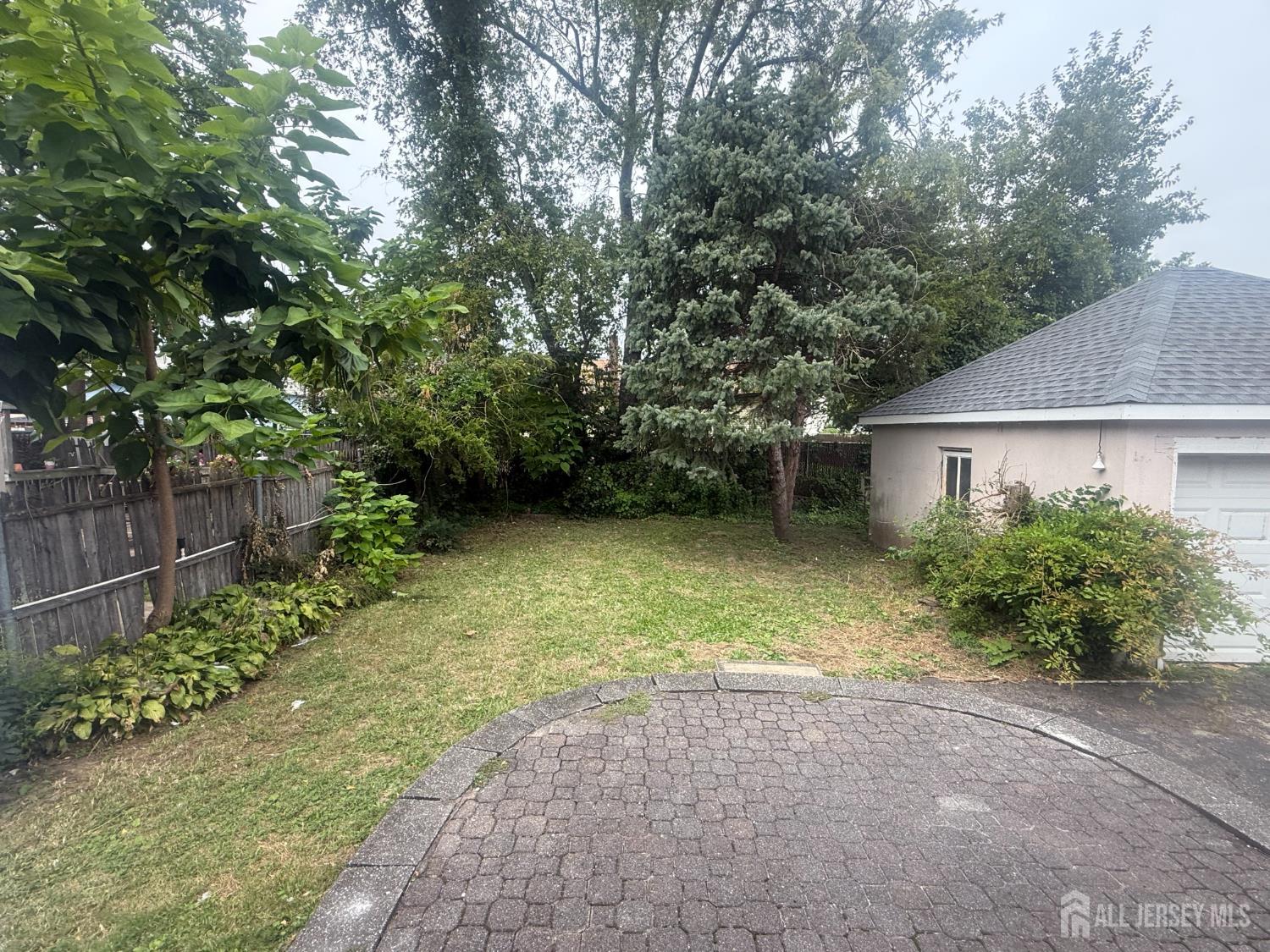 64 Fiat Avenue Iselin, NJ 08830 - Photo 17 of 25 a view of outdoor space and yard