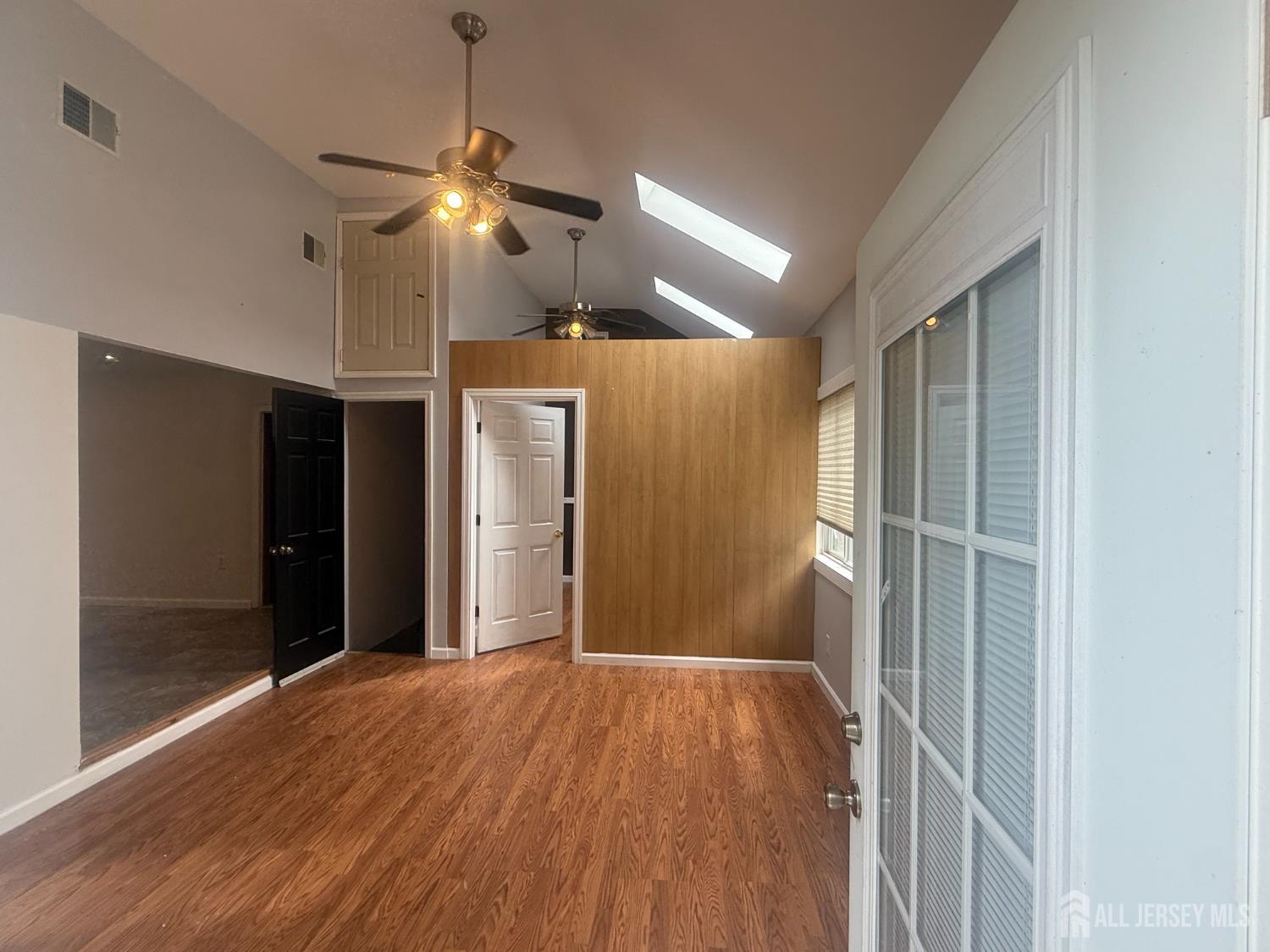 64 Fiat Avenue Iselin, NJ 08830 - Photo 18 of 25 a view of empty room with wooden floor