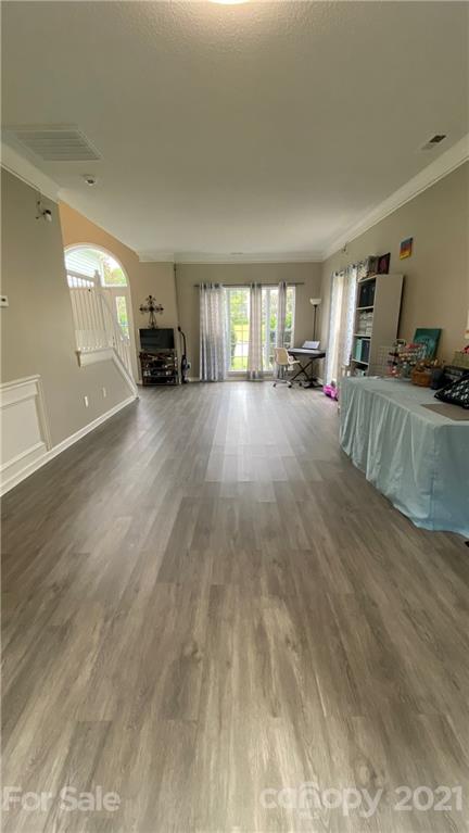 715 West Cheval Drive Fort Mill, SC 29708 - Photo 7 of 18 a view of empty room with wooden floor