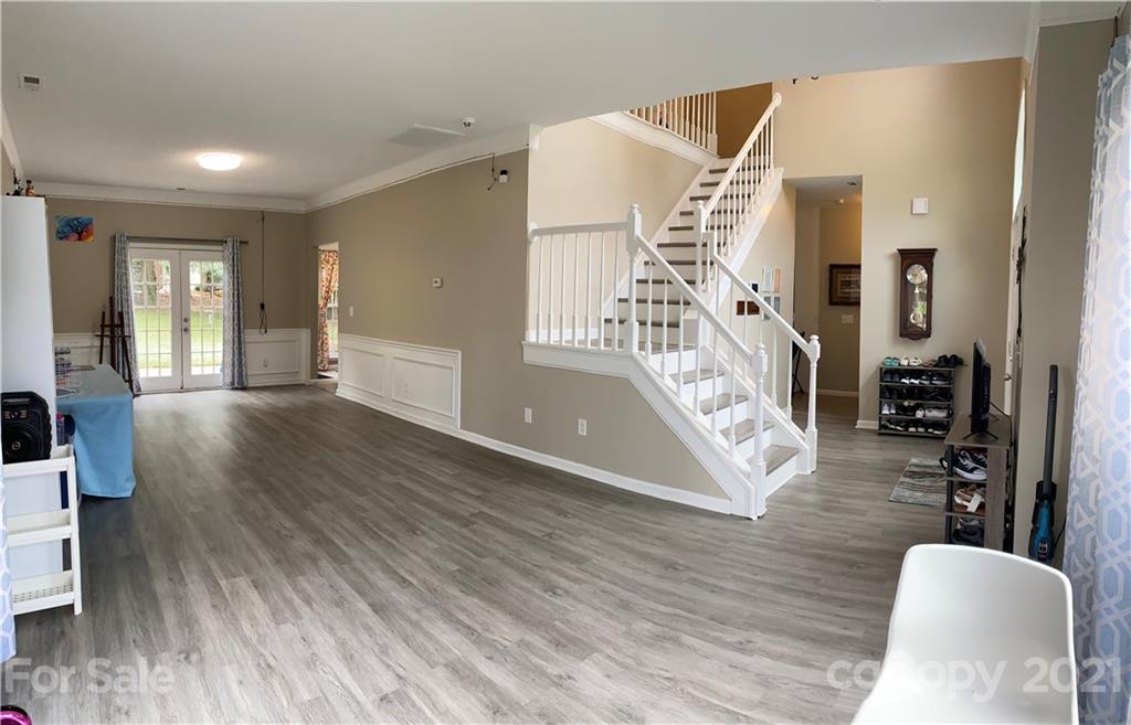 715 West Cheval Drive Fort Mill, SC 29708 - Photo 8 of 18 a view of entryway and hall with wooden floor