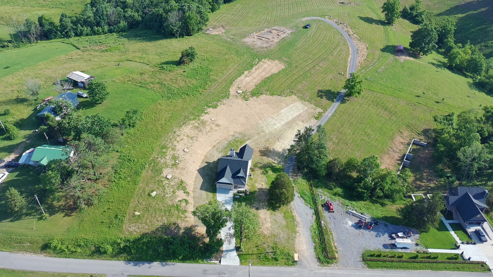2953 Wixtown Road Westmoreland, TN 37186 - Photo 7 of 35 an aerial view of a house with a yard and lake view