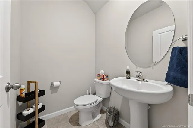 a kitchen with stainless steel appliances granite countertop a stove and a microwave