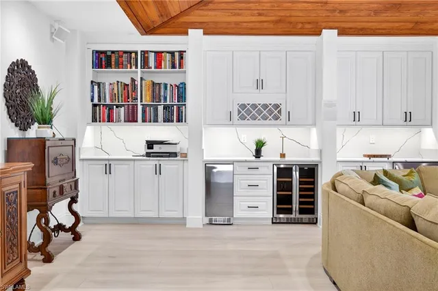 a view of kitchen with furniture and cabinet