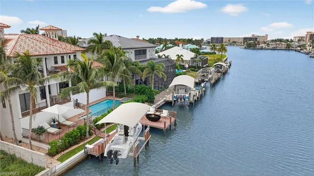 a view of a patio with furniture and a table