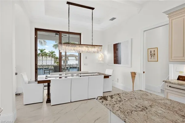 a kitchen with stainless steel appliances granite countertop a sink and cabinets