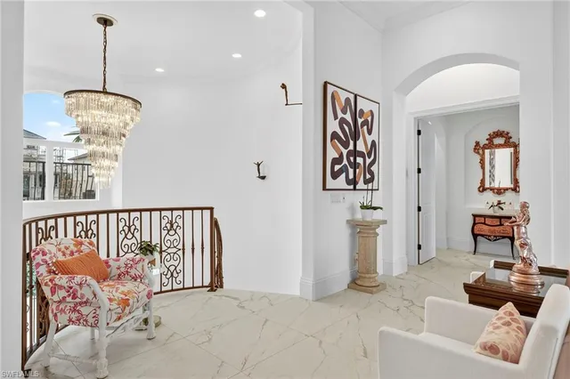 a view of a livingroom with furniture and windows