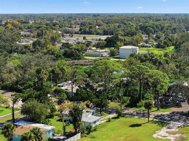 a view of a town with mountains in the background
