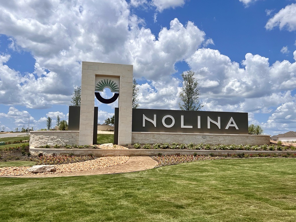 140 Pipe Cactus Pass Georgetown, TX 78633 - Photo 26 of 31 Community / neighborhood sign with a lawn