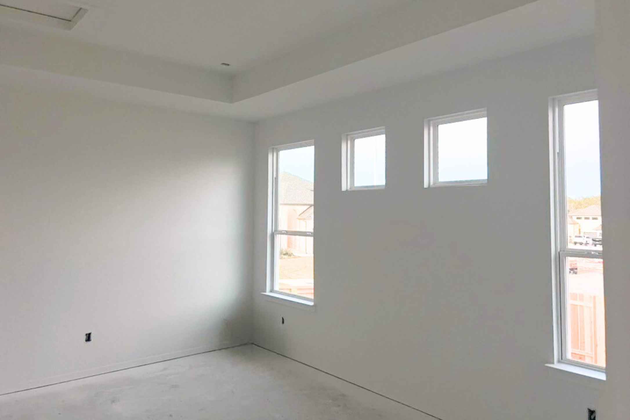 140 Pipe Cactus Pass Georgetown, TX 78633 - Photo 4 of 31 Empty room featuring concrete floors