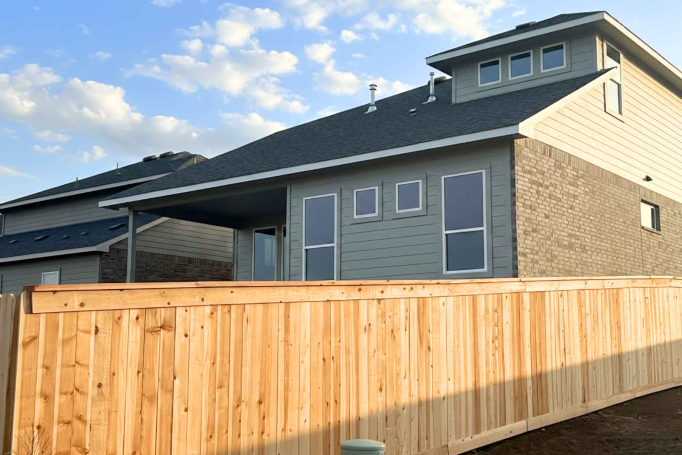 140 Pipe Cactus Pass Georgetown, TX 78633 - Photo 5 of 31 View of home's exterior with brick siding and roof with shingles