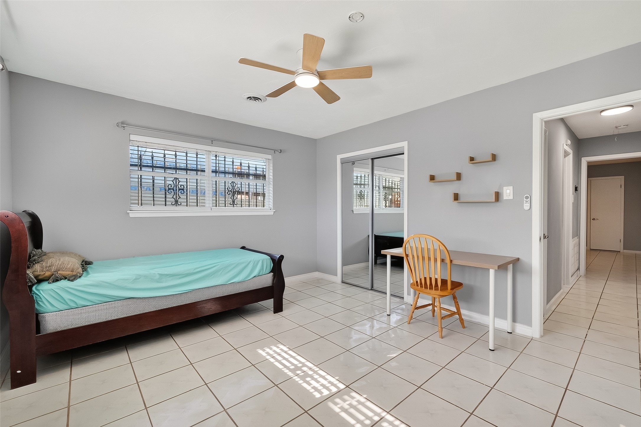 16415 1st Street Channelview, TX 77530 - Photo 18 of 28 a bedroom with furniture and window