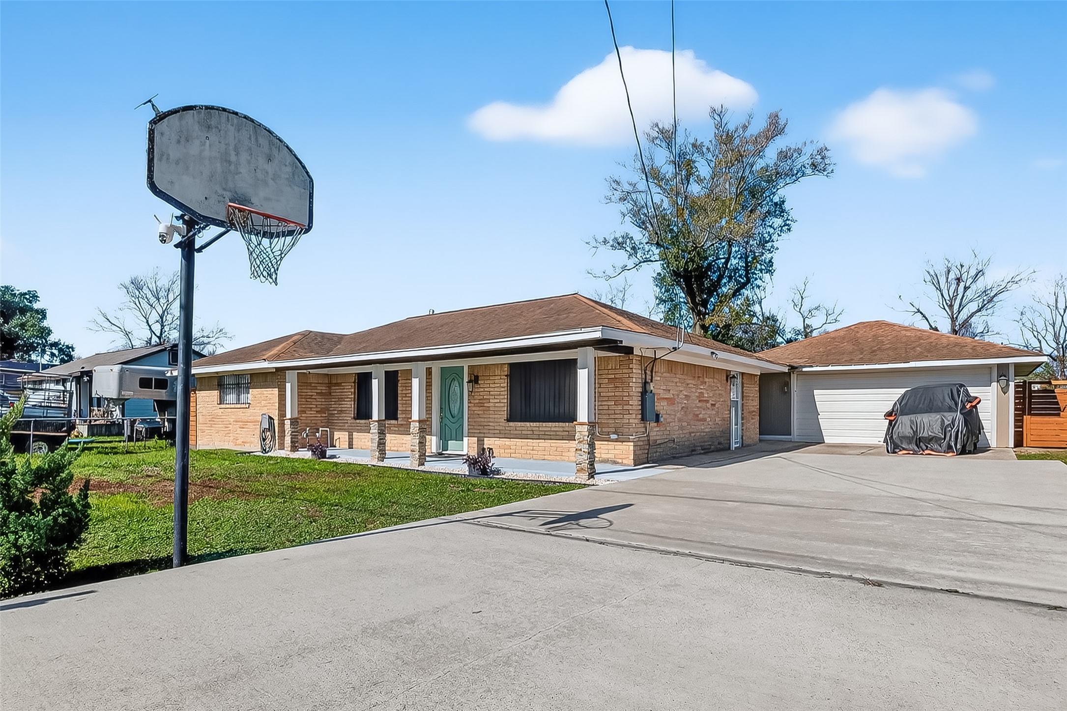 16415 1st Street Channelview, TX 77530 - Photo 2 of 28 a front view of a house with garden