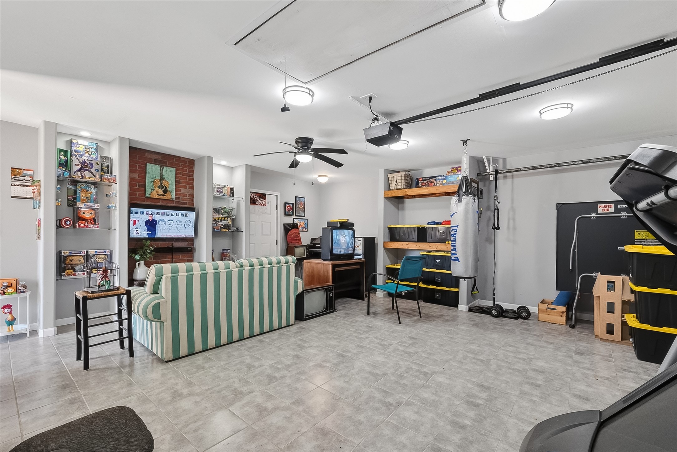 16415 1st Street Channelview, TX 77530 - Photo 21 of 28 a bedroom with furniture and a chair