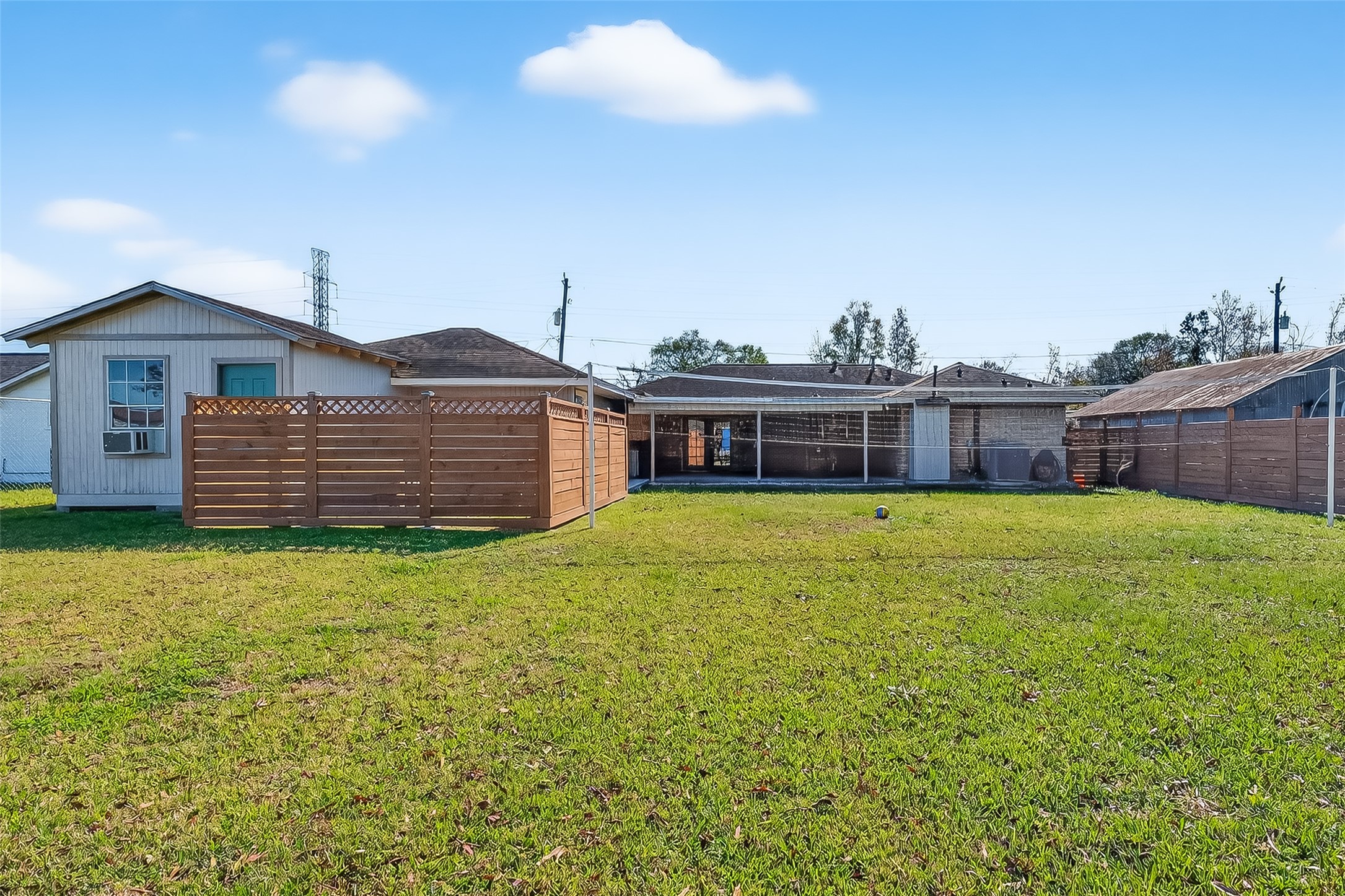 16415 1st Street Channelview, TX 77530 - Photo 26 of 28 a front view of a house with a garden