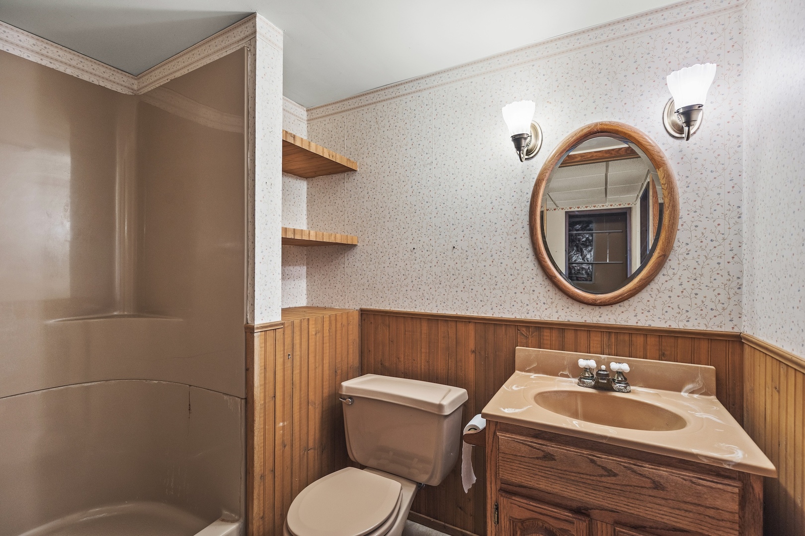 6867 North Eggert Road Rock City, IL 61070 - Photo 13 of 16 a bathroom with a toilet a sink and a mirror