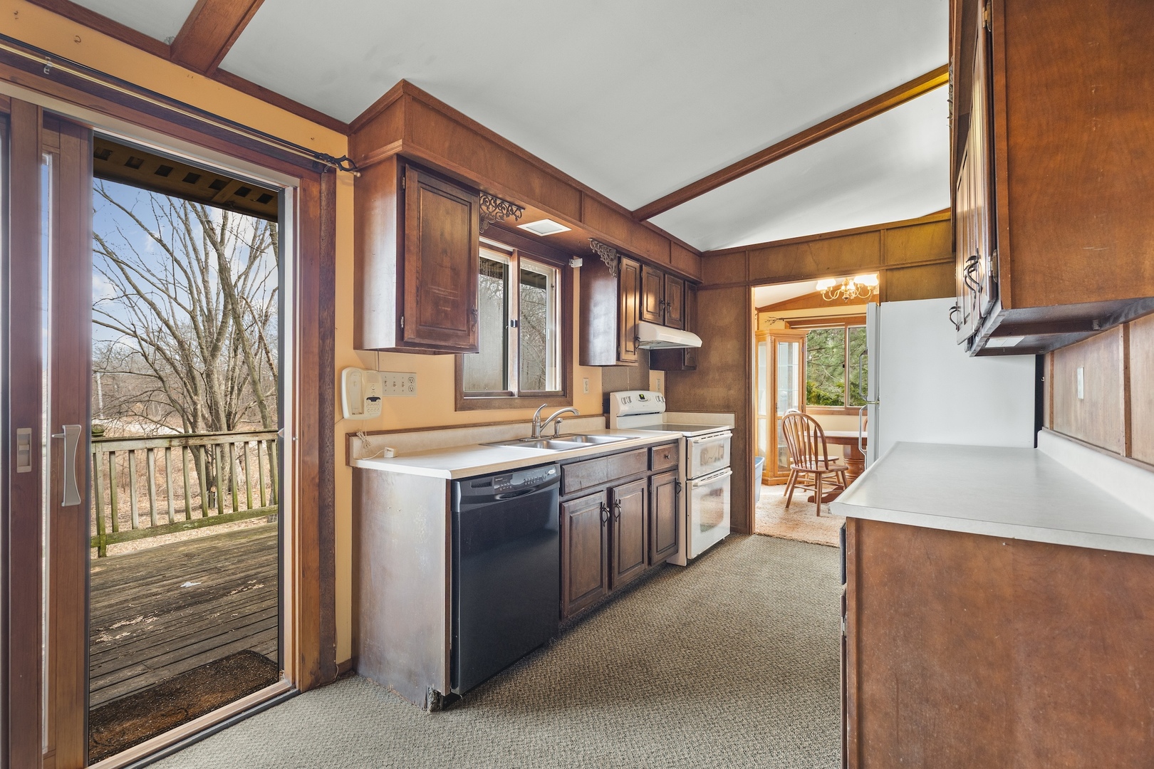 6867 North Eggert Road Rock City, IL 61070 - Photo 3 of 16 a kitchen with stainless steel appliances granite countertop a sink and a stove