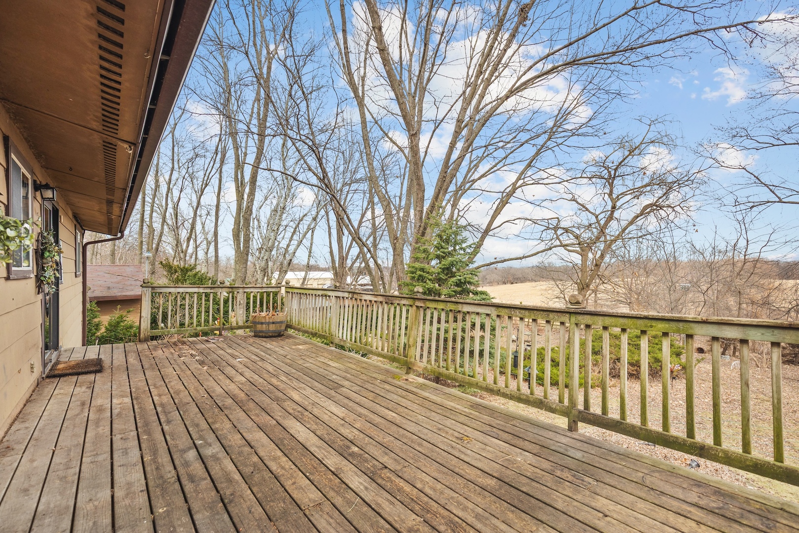 6867 North Eggert Road Rock City, IL 61070 - Photo 5 of 16 a view of backyard with a deck