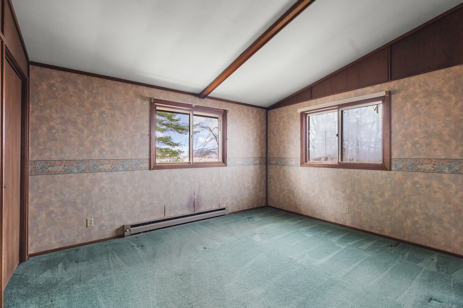 6867 North Eggert Road Rock City, IL 61070 - Photo 7 of 16 an empty room with windows