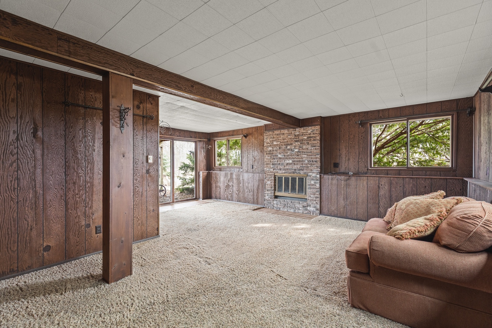 6867 North Eggert Road Rock City, IL 61070 - Photo 10 of 16 a living room with furniture and a large window