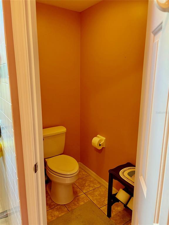 18970 Southwest 99th Street Dunnellon, FL 34432 - Photo 14 of 52 a bathroom with a toilet and a shower