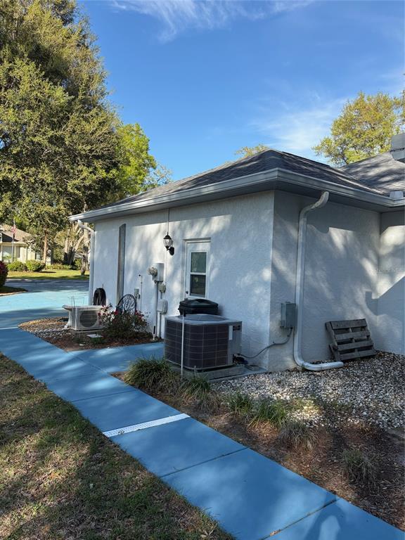 18970 Southwest 99th Street Dunnellon, FL 34432 - Photo 30 of 52 a front view of a house with garden