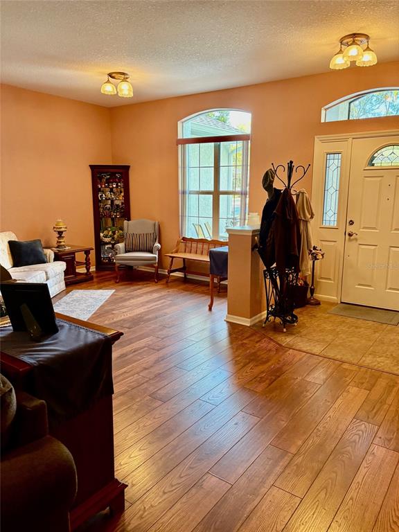 18970 Southwest 99th Street Dunnellon, FL 34432 - Photo 3 of 52 a living room with furniture and a window