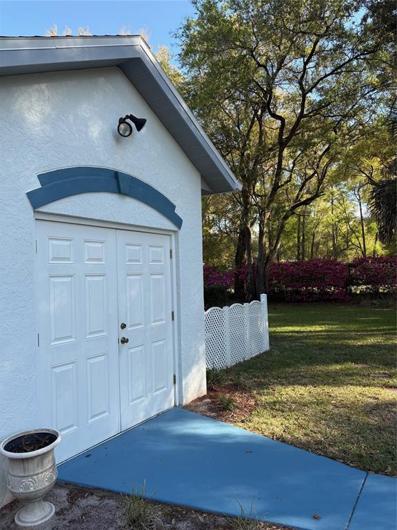 18970 Southwest 99th Street Dunnellon, FL 34432 - Photo 31 of 52 a view of a backyard of the house