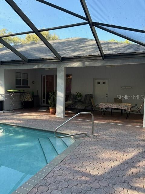 18970 Southwest 99th Street Dunnellon, FL 34432 - Photo 36 of 52 a room with lots of lights and furniture
