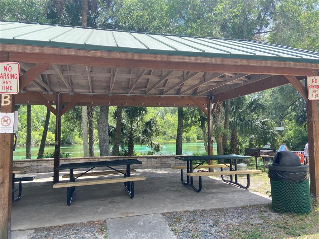 18970 Southwest 99th Street Dunnellon, FL 34432 - Photo 46 of 52 a view of a patio with a table and chairs